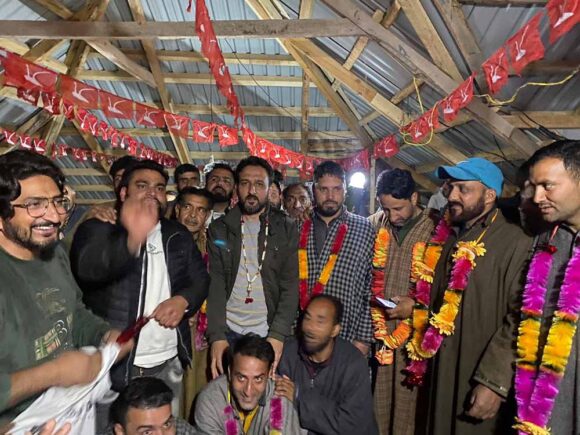 Inspite of rains, party workers from town Chawalgam attended a late evening election meeting