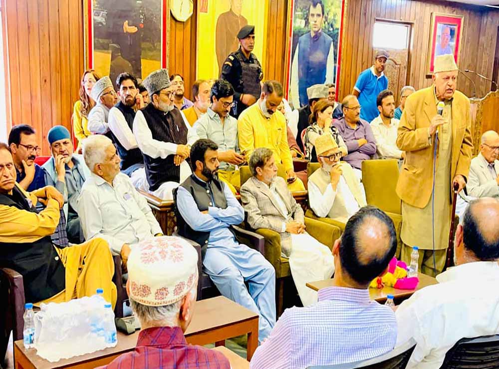 Dr. Farooq Abdullah presides over a congratulatory meeting at Nawa i SubhaLeads party functionaries in congratulating Aga Syed Ruhullah Mehdi, Mian Altaf Ahmad Larvi 